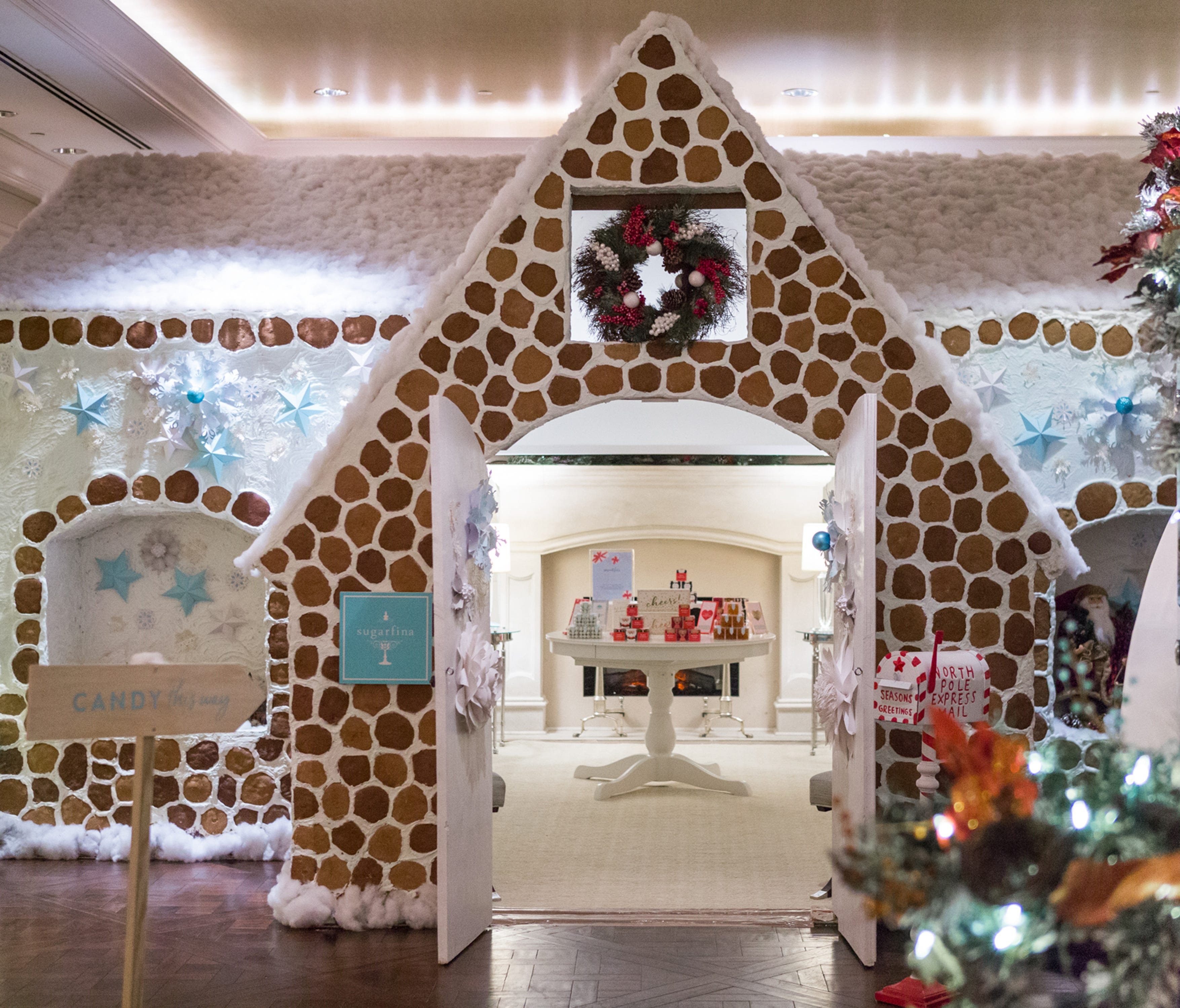 The St. Regis Atlanta hosts the city's largest gingerbread house in its lobby with a Sugarfina pop-up selling high-end candy inside through Jan. 1.