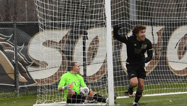 Western Michigan's Kosti Moni celebrates after scoring.