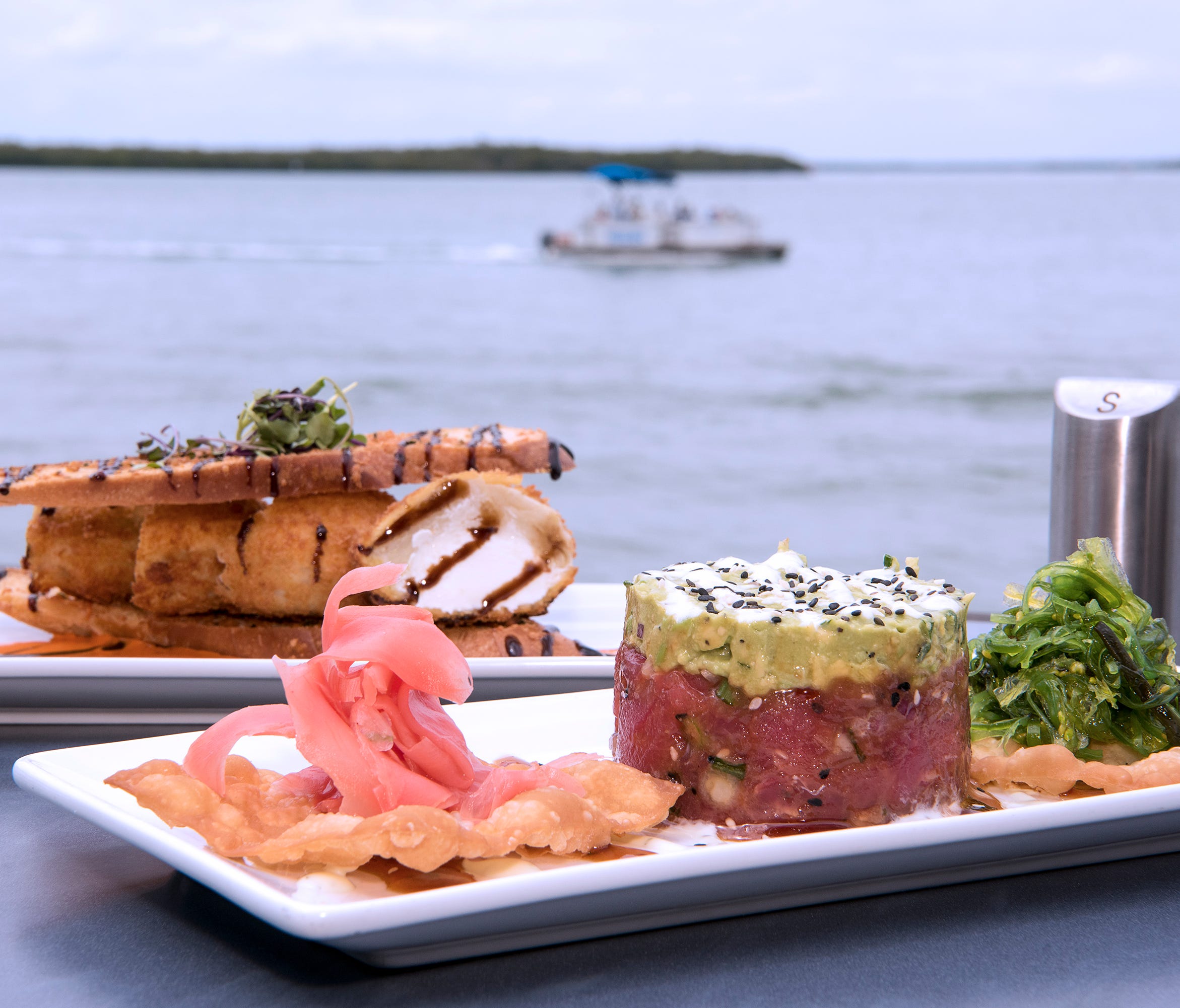 Flipper's on the Bay, in Fort Myers Beach, combines great food with eye-catching scenery overlooking Estero Bay at Lovers Key Resort. Well-executed dishes include tuna ceviche with pickled ginger, cucumber and avocado relish, as well as stuffed artic