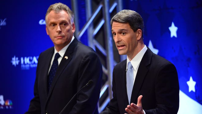 Democrat Terry McAuliffe, left, and Republican Ken Cuccinelli, right, during a debate for Virginia governor.