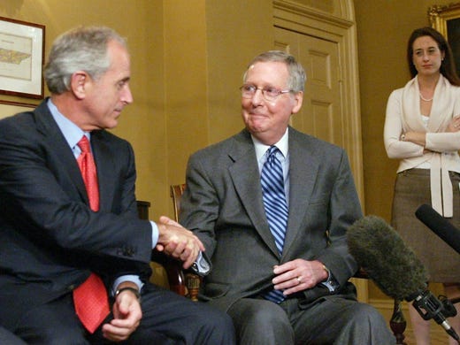 Nov. 14, 2006: Sen. Mitch McConnell, right, greets
