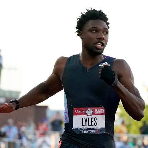Noah Lyles competes in the second semi-final of th