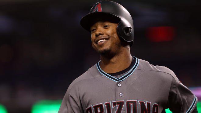 Arizona Diamondbacks second baseman Jean Segura (2) smiles while jogging to the dugout after hitting a solo home run against Washington Nationals starting pitcher Max Scherzer in the first inning at Nationals Park.
