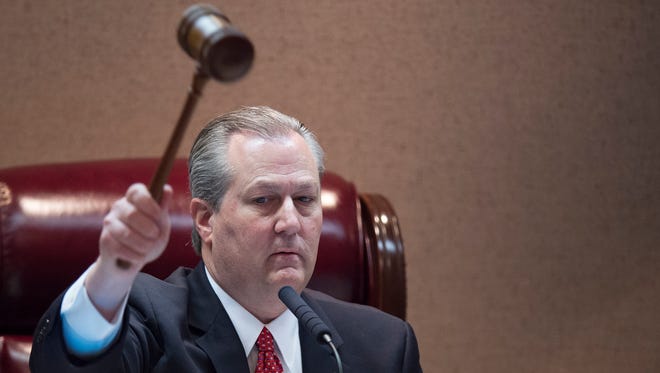 Alabama Speaker of the House Mike Hubbard pounds the gavel marking the end of the first day of the 2016 legislative session on Tuesday, Feb. 2, 2016, at the State House building in Montgomery, Ala.