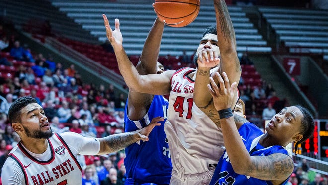 Ball State's Trey Moses fights for a rebound against Indiana State's defense during their game at Worthen Arena Tuesday, Nov. 15, 2016. 