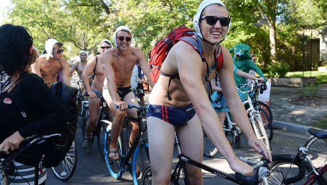 Tour de Fat bike parade participants show off their costumes September 3, 2016..