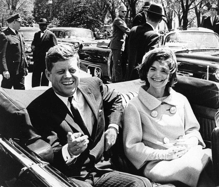 A handout photo made available by John F. Kennedy presidential Library shows President John F. Kennedy and first lady Jacqueline Kennedy following arrival ceremonies for H. E. Habib Bourguiba, President of Tunisia, at Blair House, in Washington, D.C.