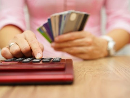 credit-cards-and-calculator_gettyimages-497316392_large.jpg