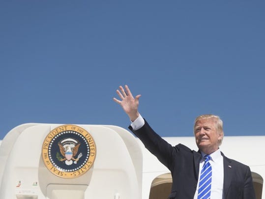 president-trump-waving-from-air-force-one_large.jpg