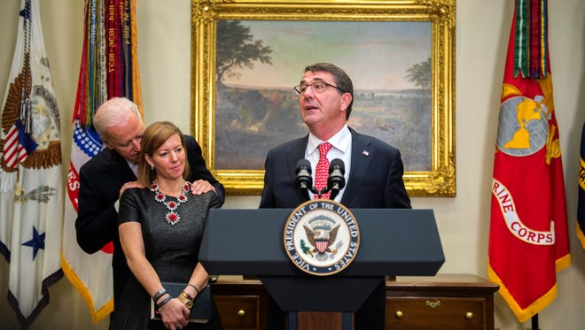 Secretary of Defense Ashton Carter with Vice President Biden and wife Stephanie Carter.