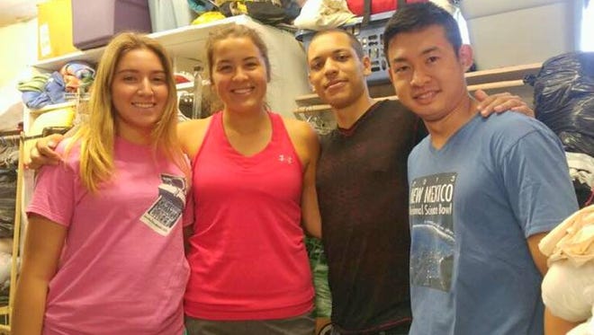University of New Mexico’s BA/MD Program participants, while on track to become doctors, have been aiding Silver City Gospel Mission this summer. (Right to left) Sally Midani, Isabella Cervantes, Elijah Johnson, and Dang Vu helped create a mental health screening for the Mission’s clients between their time shadowing doctors at local medical clinics.