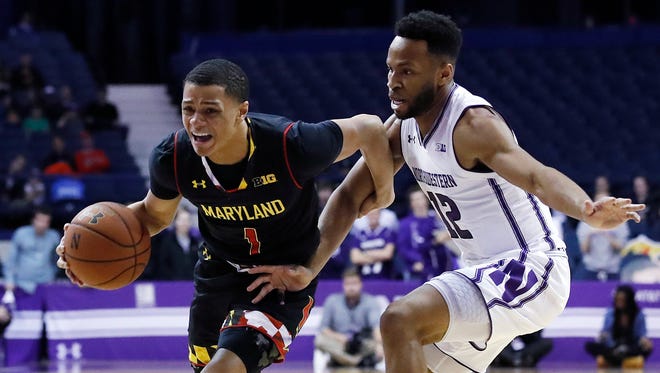 Maryland guard Anthony Cowan, left, is guarded by Northwestern guard Isiah Brown during the first half of Monday's Big Ten game.