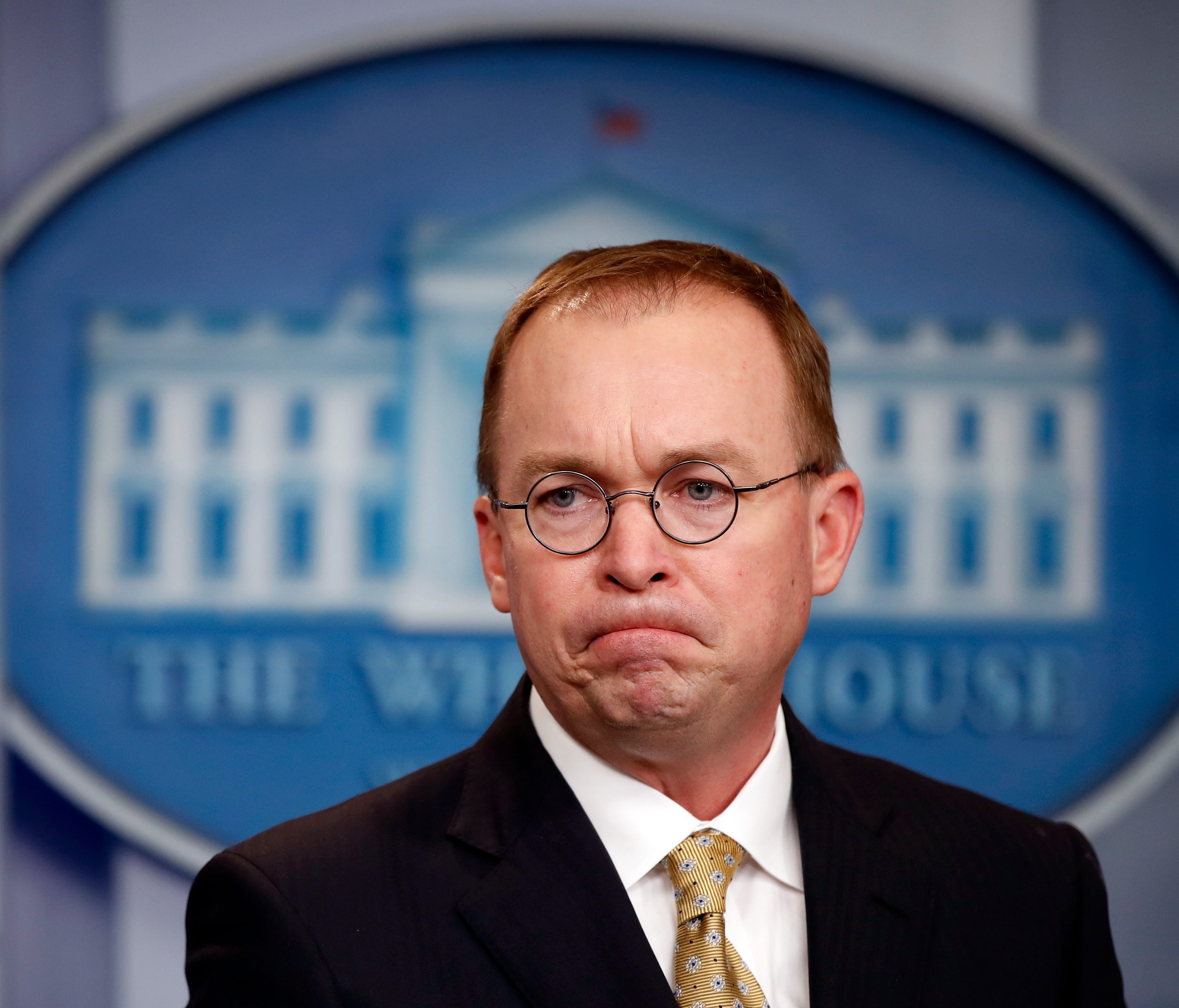 White House budget director Mick Mulvaney listens to a question during a press briefing at the White House Jan. 20.