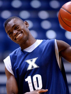 The Enquirer recently caught up with former Xavier basketball great, Romain Sato, to see what the 2004 grad is up to these days. Photo from 2002.