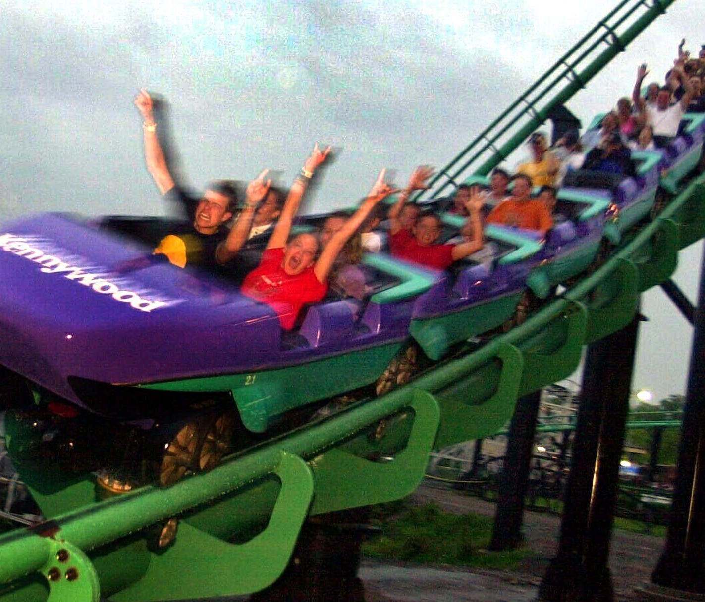 Amusement park visitors ride the Phantom's Revenge coaster at Kennywood Park in West Mifflin, Pa., in 2001.