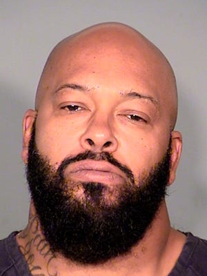 This Oct. 29, 2014 photo provided by the Las Vegas Metropolitan Police Department shows Marion "Suge" Knight. Knight and comedian Katt Williams were arrested and charged with robbery Wednesday,  Oct. 29, 2014, after a celebrity photographer reported the men stole her camera last month. Knight, arrested at a location in Las Vegas, has a prior conviction for assault with a deadly weapon and could face up to 30 years in prison if convicted. (AP Photo/Las Vegas Metropolitan Police Department) ORG XMIT: LA109