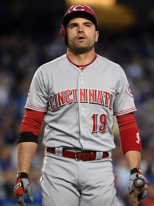 Cincinnati Reds first baseman Joey Votto (19) reacts after striking out against the Los Angeles Dodgers during a MLB game at Dodger Stadium.