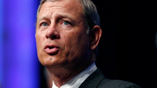 Supreme Court Chief Justice John Roberts, clearly a conservative on the high court, came under fire from GOP presidential candidates during a debate Wednesday for not being conservative enough.