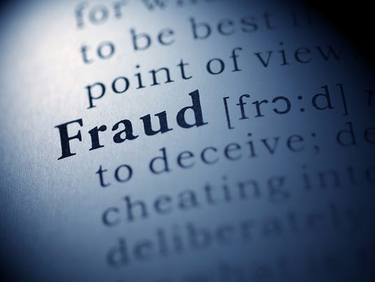Picture of a dictionary page explaining the word fraud