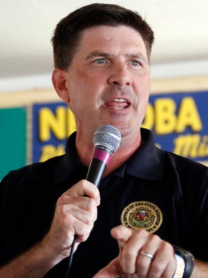 State Auditor Stacey Pickering gestures during his address at the Neshoba County Fair in Philadelphia, Miss., in 2014.