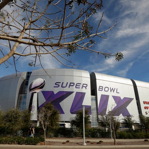 The Super Bowl XLIX logo is displayed on the Unive