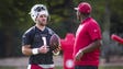 Arizona Cardinals quarterback Trevor Knight gets instruction