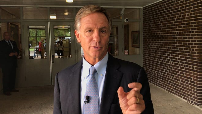 Gov. Bill Haslam answers questions Friday, May 5, 2017 outside of Sam Houston Elementary School in Maryville.