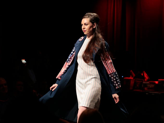 Models walk the runway wearing clothing inspired by