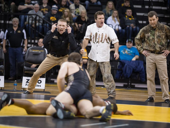 The Iowa wrestling coaching staff, Ryan Morningstar,
