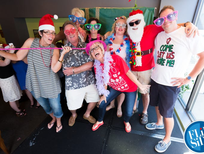 Photobooth portraits bring Christmas to July at the