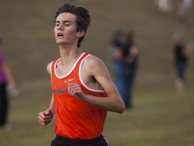 Northeastern's Ben Kelly races to the finish line to
