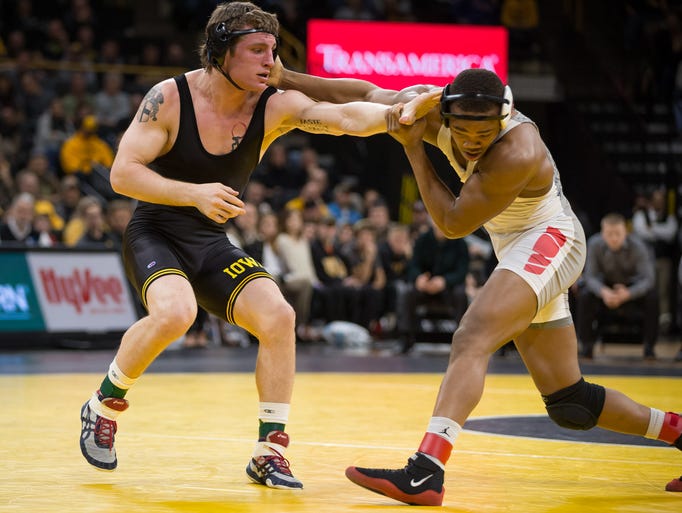 Iowa senior Sammy Brooks pushes Ohio State sophomore