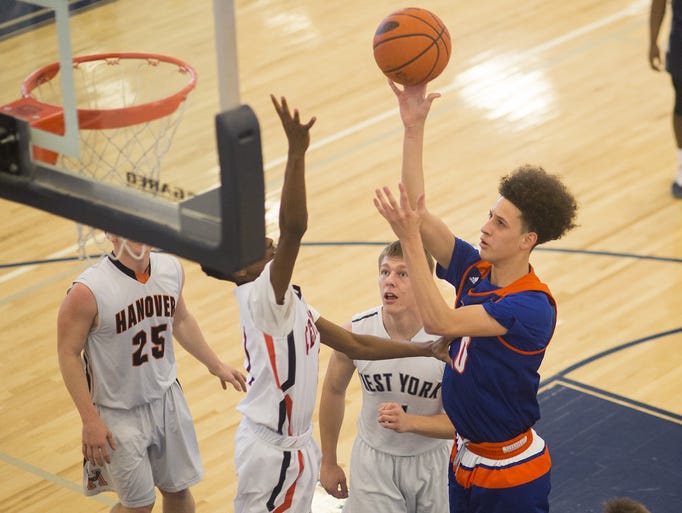 York High's Jayden Iturmendi, of Team 2, right, drives
