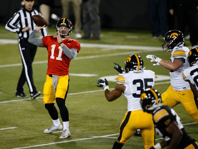 Iowa sophomore quarterback Ryan Boyle (11) passes during