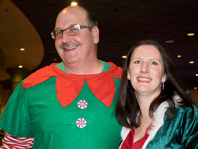 Charlie and Catherine Chuck spread some holiday cheer