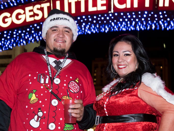 Alfredo and Jazmin Ramirez spread some holiday cheer