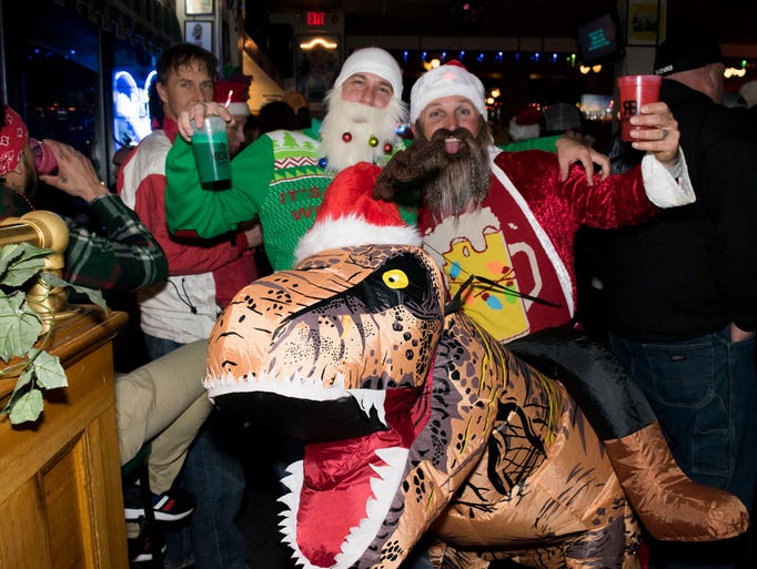 A scene from the Santa Crawl on Saturday in downtown