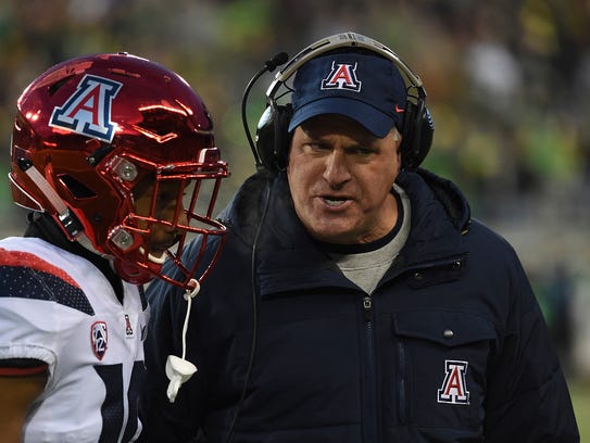 Rich Rodriguez has some words with safety Scottie Young