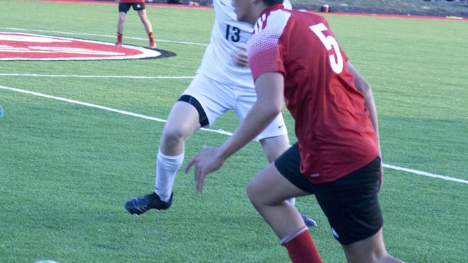 Ottawa High School sophomore Juan-Diego Ortiz rushes the ball up the field against Spring Hill on Thursday at home. The Cyclones fell 4-2 to the Broncos.