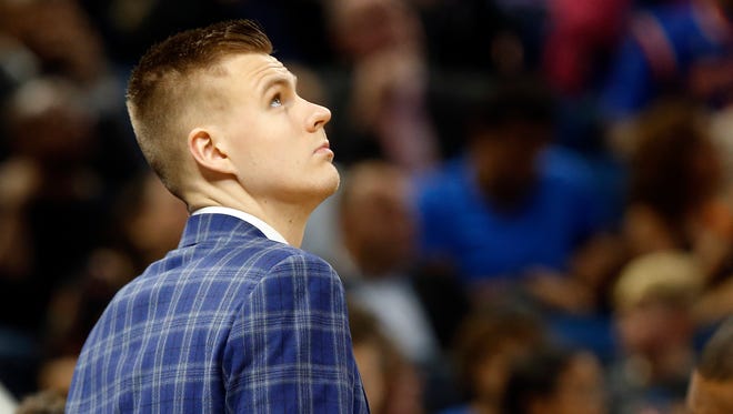 New York Knicks forward Kristaps Porzingis looks on against the Orlando Magic during the first quarter at Amway Center.