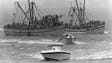 Two shrimp boats loaded with Cuban refugees head into
