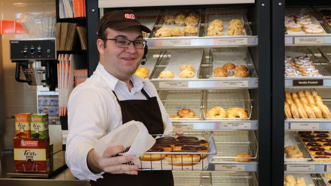 Logan Schultz is on staff at the new Farmington Dunkin’ Donuts.