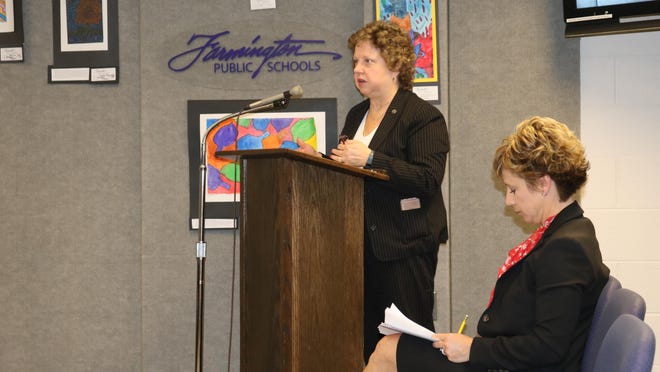 Mary Reynolds, executive director of business services, presents the proposed 2016-17 budget to the Board of Education. Also pictured is Jennifer Kaminski, business office director.
