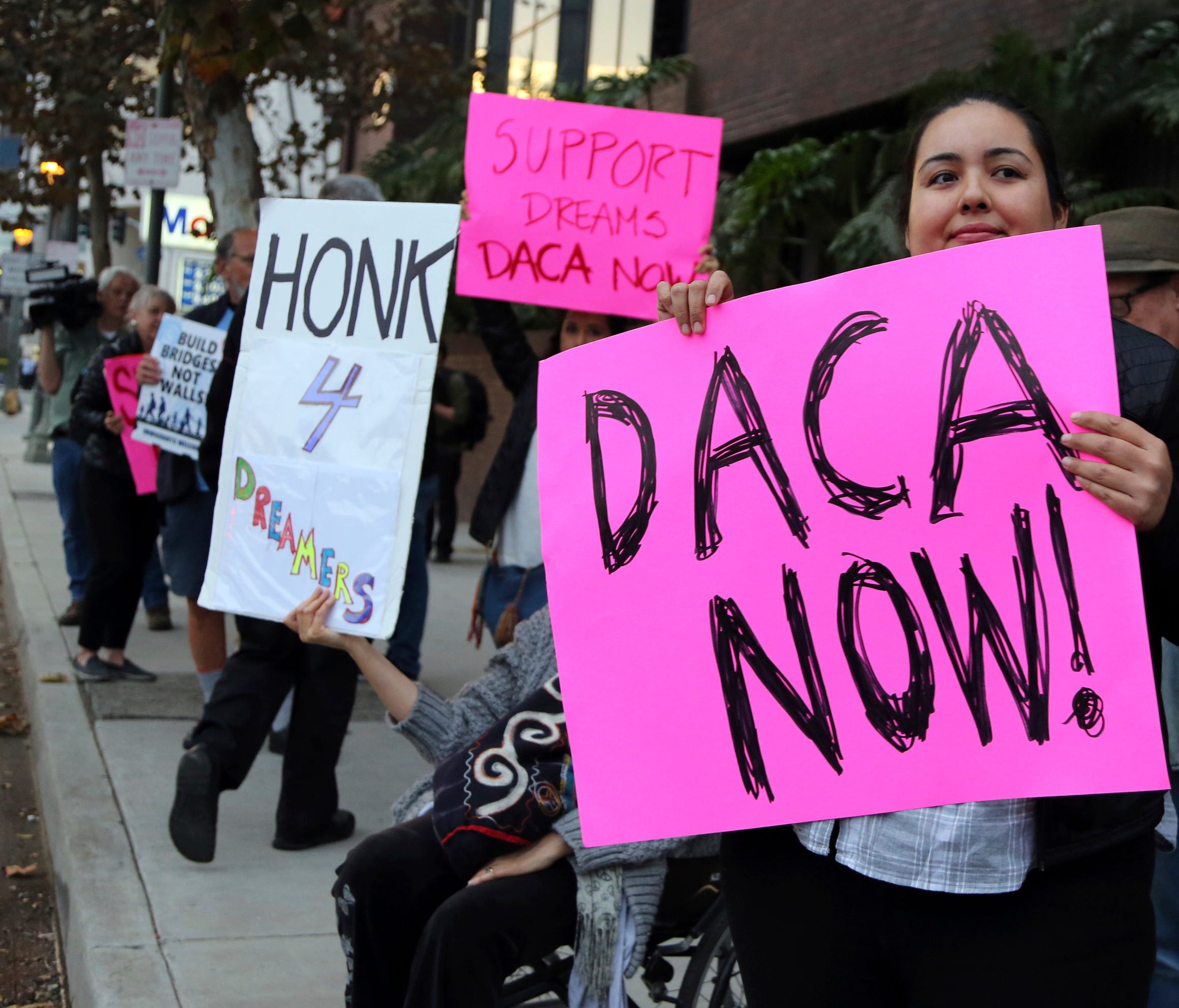 Demonstrators urge to protect the Deferred Action for Childhood Arrivals (DACA) program rally outside the office of Sen. Dianne Feinstein in Los Angeles.