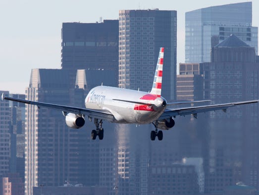 An American Airlines Airbus A321 lands at Boston Logan