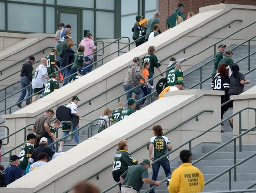 Fans begin making their way up to the Oneida Gate before the game.