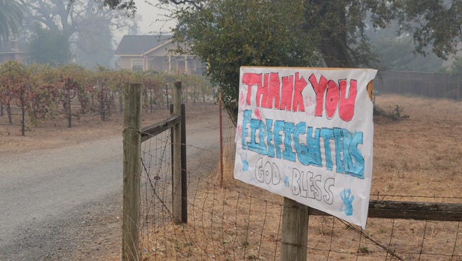 A sign thanking firefighters on Highway 12 just outside Sonoma, Calif.