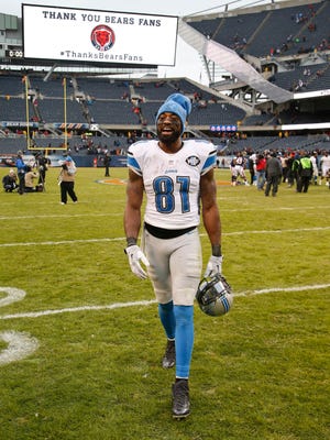 Detroit Lions wide receiver Calvin Johnson walks off of the field after a game against the Chicago Bears at Soldier Field.