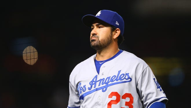 Adrian Gonzalez was traded from the Dodgers to the Braves in December as part of a five-player deal, and then released.
