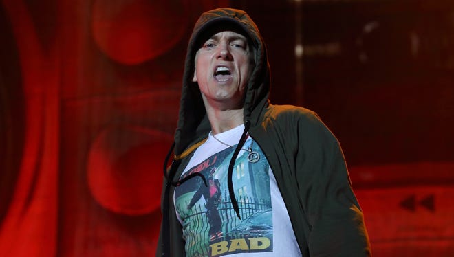Eminem performs at Lollapalooza in Chicago's Grant Park on Friday, Aug. 1, 2014. (Photo by Steve C.  Mitchell/Invision/AP)